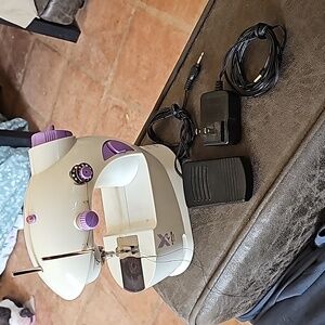 Minature sewing machine